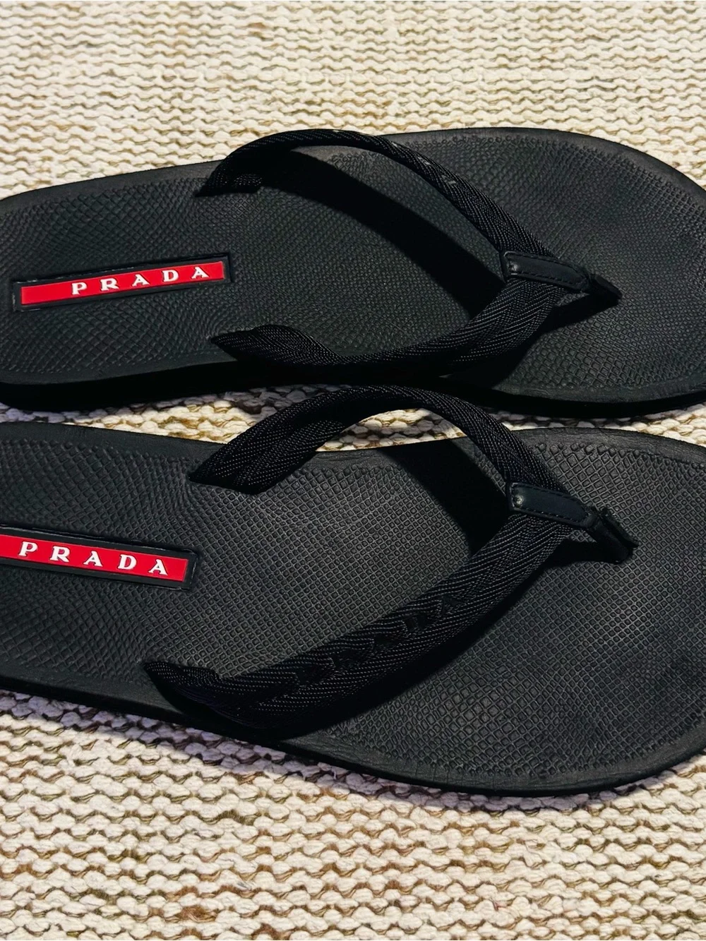 Prada Black Flip-Flop Sandals with Red Logo Accents